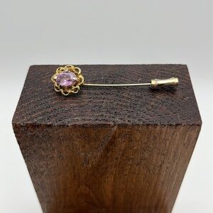Delicate vintage gold tone stick pin light purple/lavender center “stone”